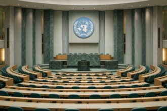 Albanese Urges US-China AI Deal Like Nuclear Treaty, United Nations General Assembly hall.